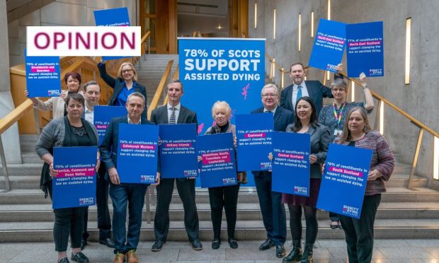 Liberal Democrat MSP Liam McArthur (centre, left), alongside other MSPs, at Holyrood after publishing his Assisted Dying for Terminally Ill Adults (Scotland) Bill. Image: Jane Barlow/PA Wire