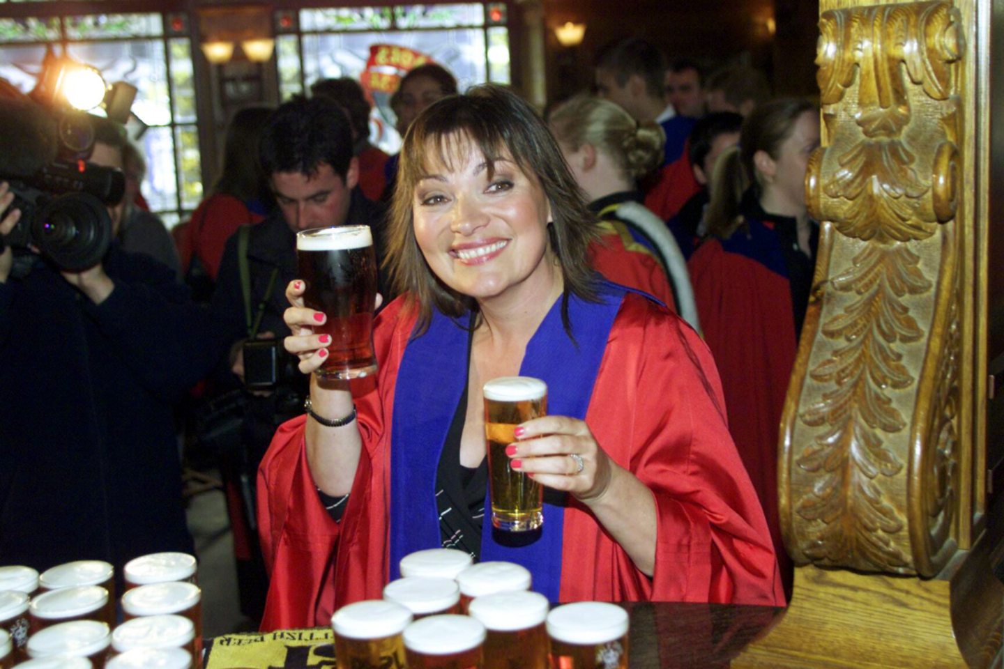 New rector at Dundee University Lorraine Kelly gets in a pint or two in the Trades House Bar during her tour