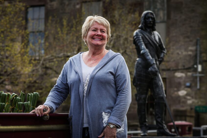 Robina Addison MBE at the Marquis of Montrose statue.