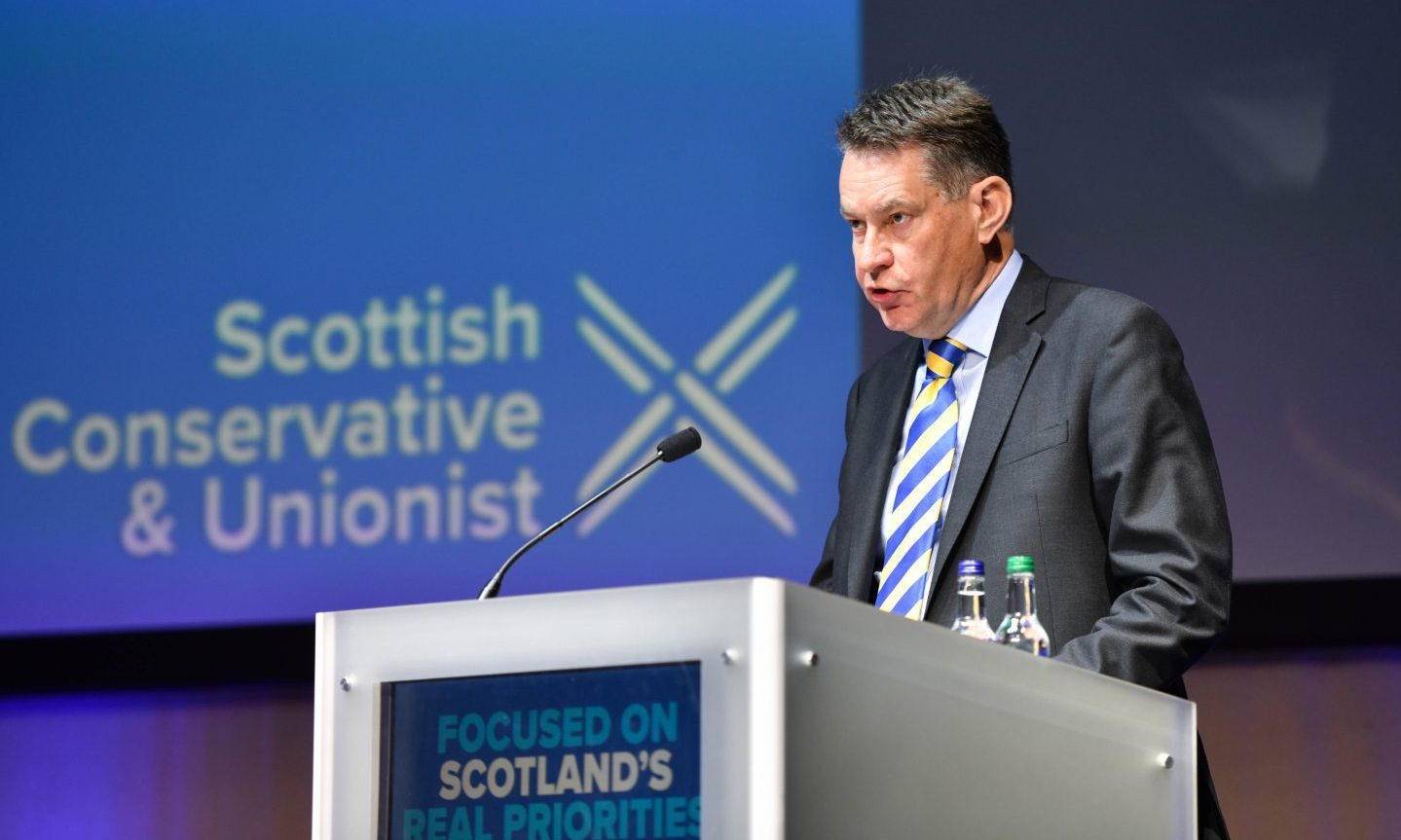 Perthshire Scottish Conservative MSP Murdo Fraser stands at a lectern