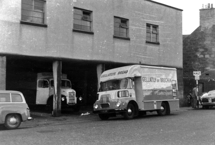 Vans outside James Gellatly, which was a famous bakery firm. 