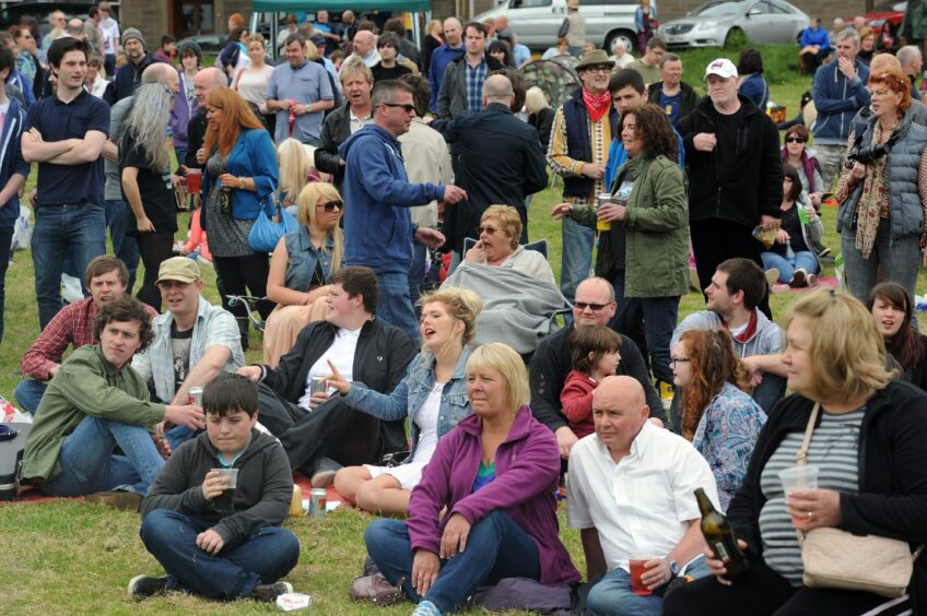 The crowd enjoying a performance from Revolver in 2013. 