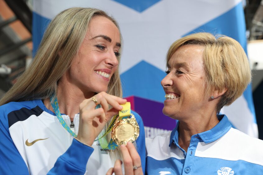Eilish and Liz celebrate gold in Birmingham in 2022.