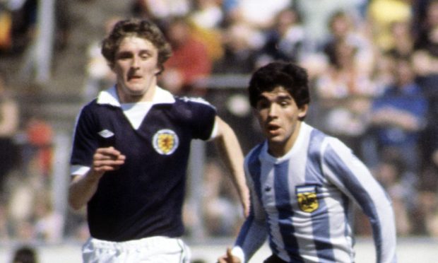 Diego Maradona gets away from Scotland's Paul Hegarty in 1979. Image: SNS.
