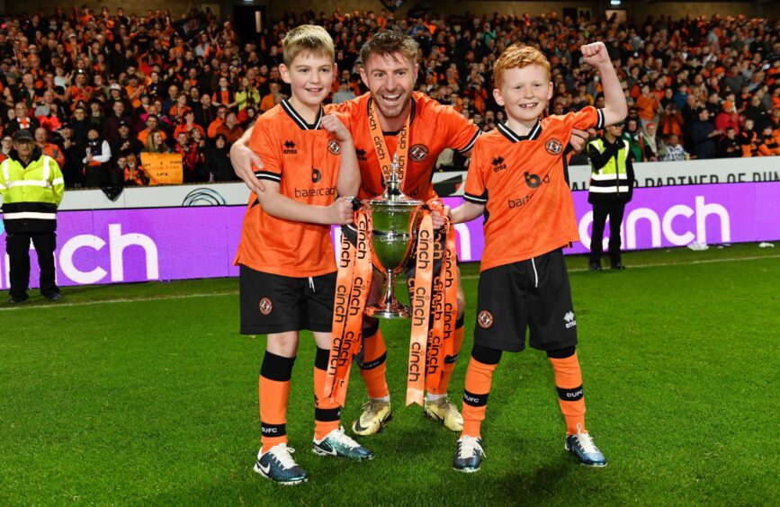 Ross Docherty laps up the celebrations following a trophy-winning debut season at Tannadice