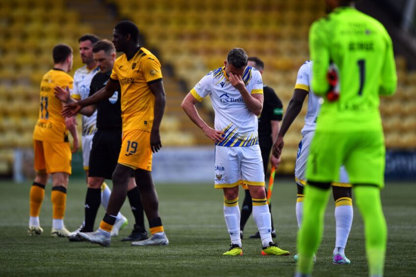 The St Johnstone players were distraught at full-time. 