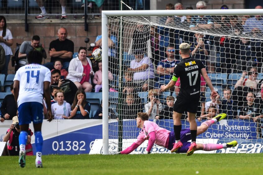 Luke McCowan sees his penalty fly past the post. Image: Shutterstock