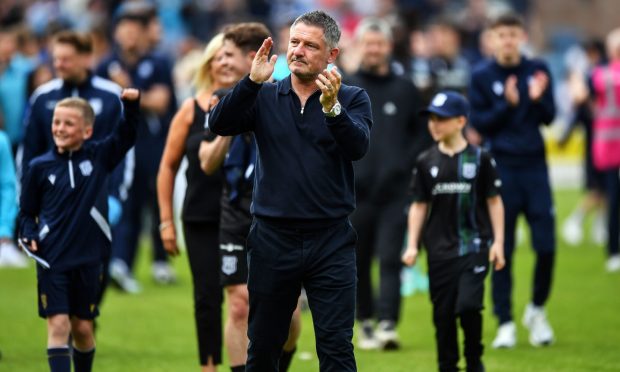 Tony Docherty thanks the Dundee fans after the final whistle against Kilmarnock. Image: Shutterstock