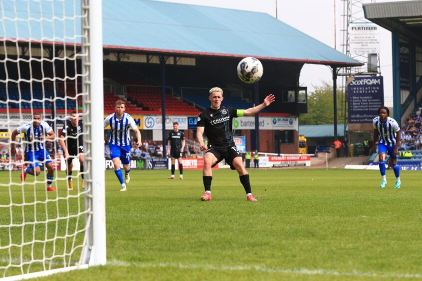 Luke McCowan sees his penalty kick fly wide. Image: Shutterstock