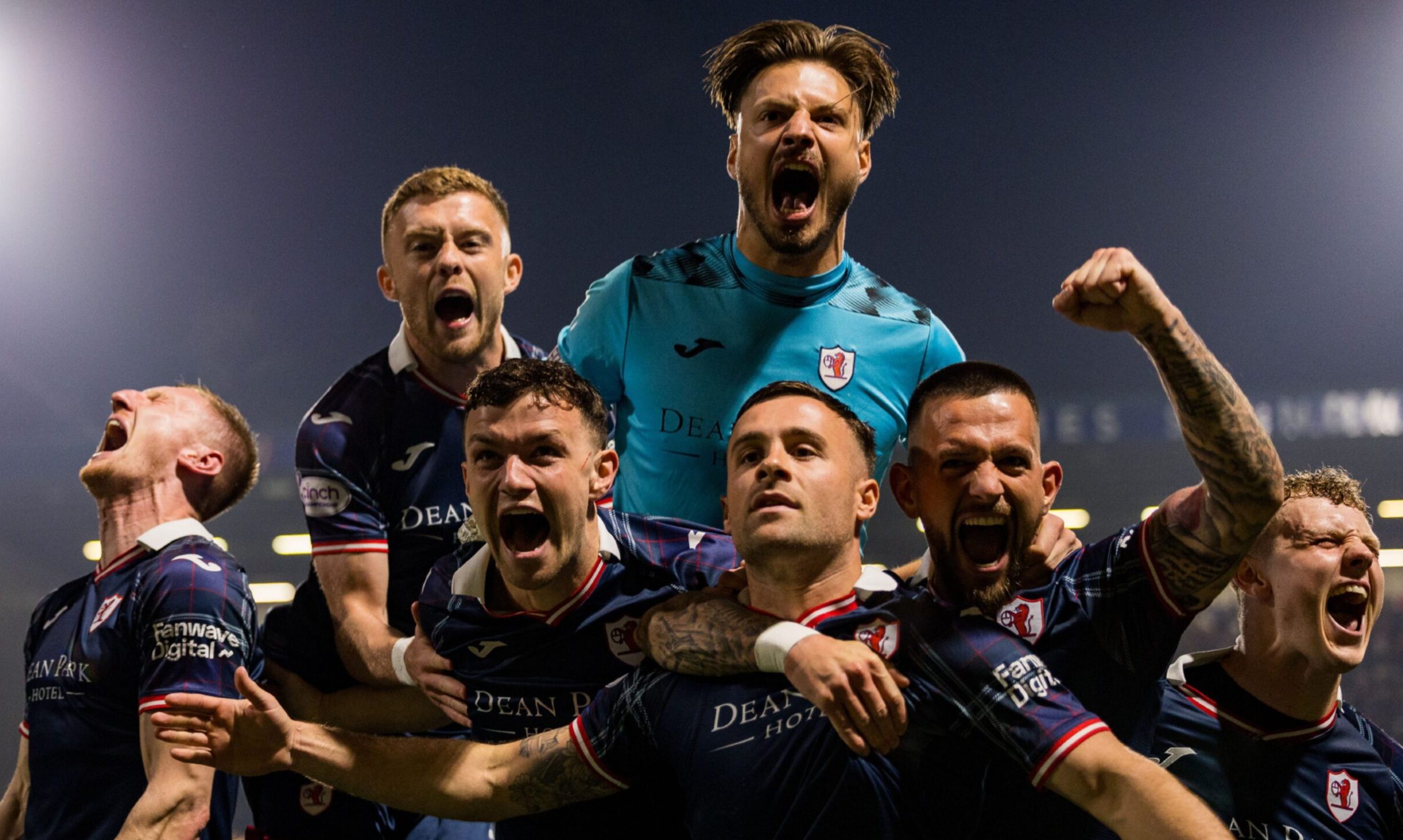 The Raith Rovers players celebrate after beating Partick Thistle.