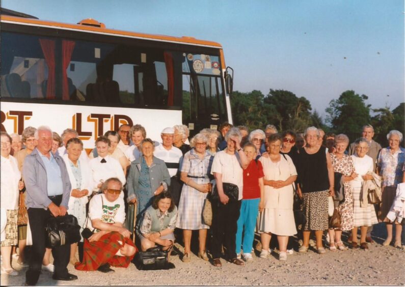 those going on the Wishart coach trip in 1995 prepare to board the bus 