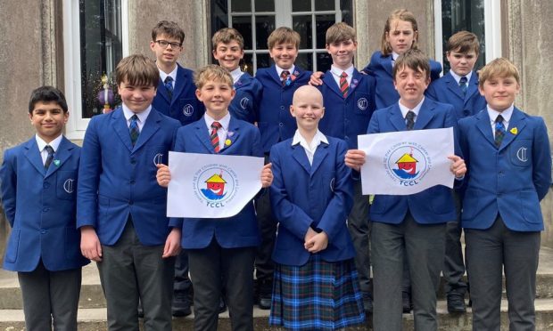 Form 8 pupils pictured with Orla Blues, 12, at Craigclowan School and Nursery, Perth.
