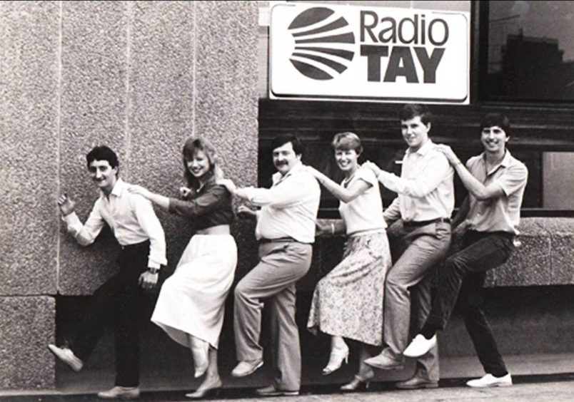 Radio Tay DJs outside the station's premises