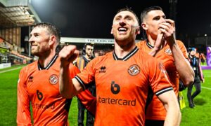 Louis Moult celebrates with Dundee United team-mates David Wotherspoon and Ross Graham. Image: SNS.