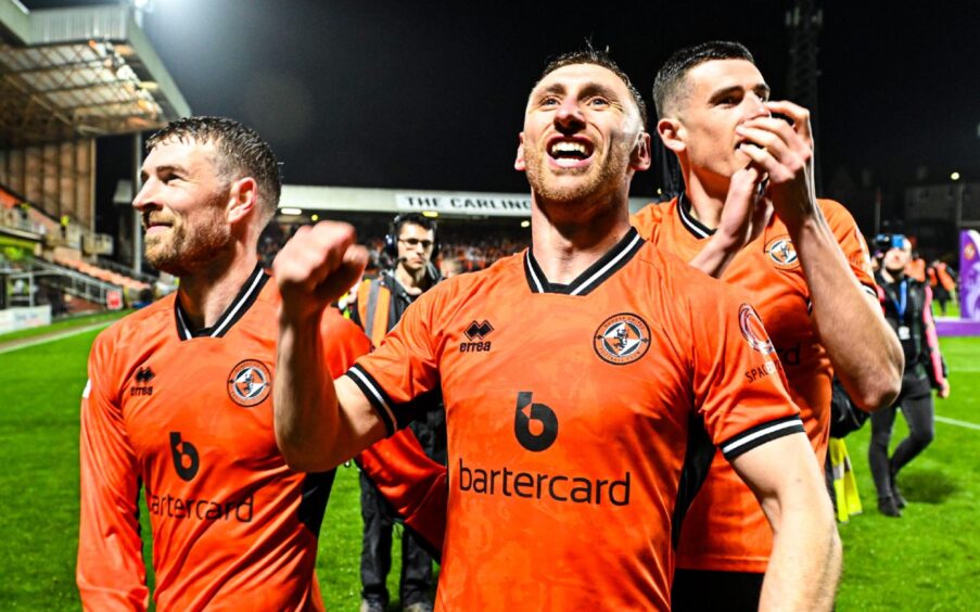 Dundee United's Louis Moult leads the celebrations following a comprehensive victory over Partick Thistle