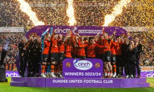 Dundee United lift the trophy.