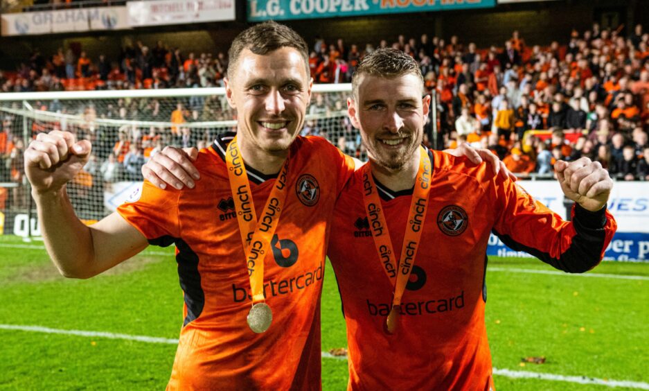 David Wotherspoon, right, celebrates Dundee United's title win
