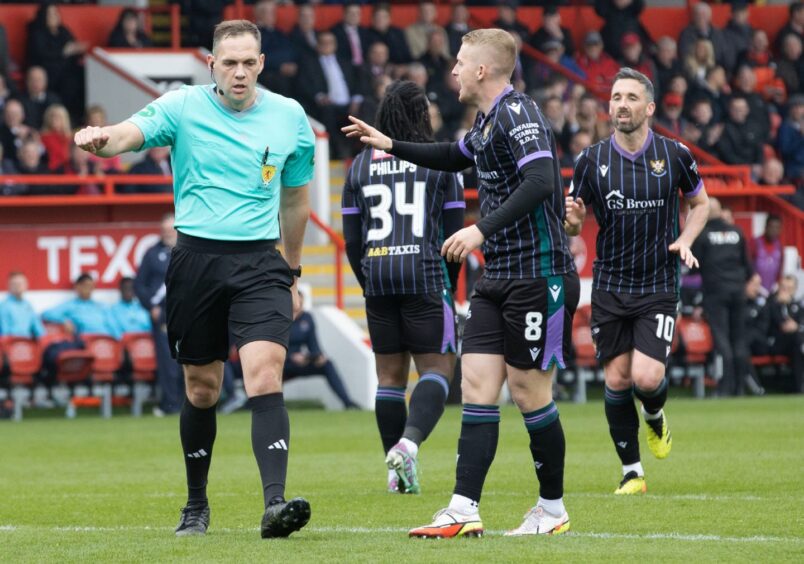 Referee Chris Graham wasn't interested in the Perth protests after the penalty was awarded. 