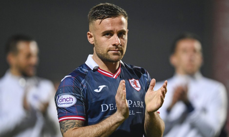 Raith Rovers striker Lewis Vaughan claps his hands.