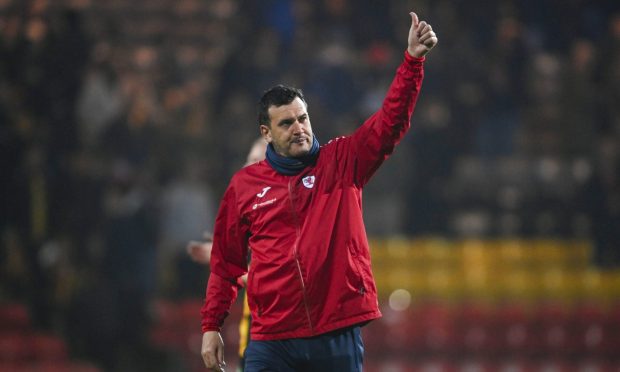Manager Ian Murray gives the Raith Rovers supporters the thumbs up.