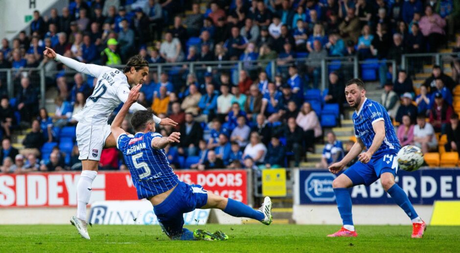 Yan Dhanda smashes the ball past Dimitar Mitov.