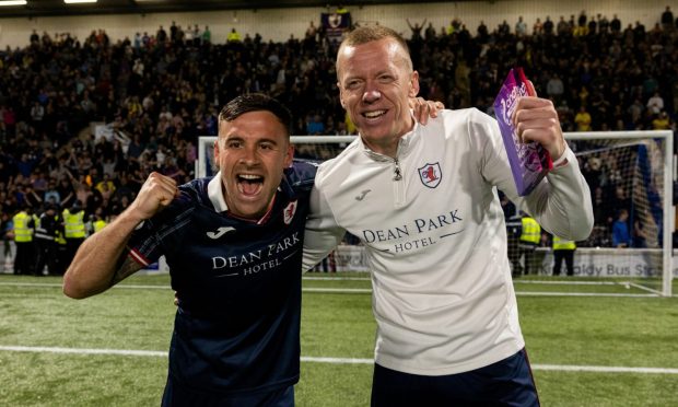 Raith Rovers duo Lewis Vaughan and Scott Brown celebrate.