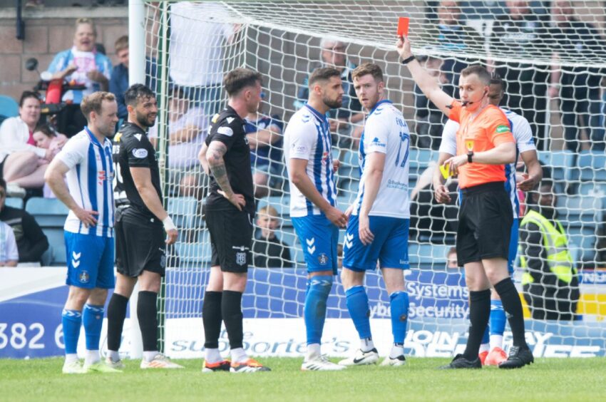 Robbie Deas is sent off after a VAR review. Image: SNS