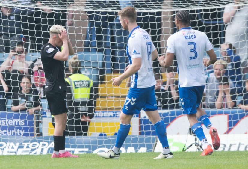 Luke McCowan reacts after missing the late penalty against Kilmarnock. Image: SNS