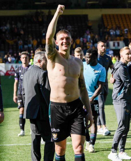 Liam Gordon salutes the fans on the pitch after he helped keep St Johnstone in the Premiership. 