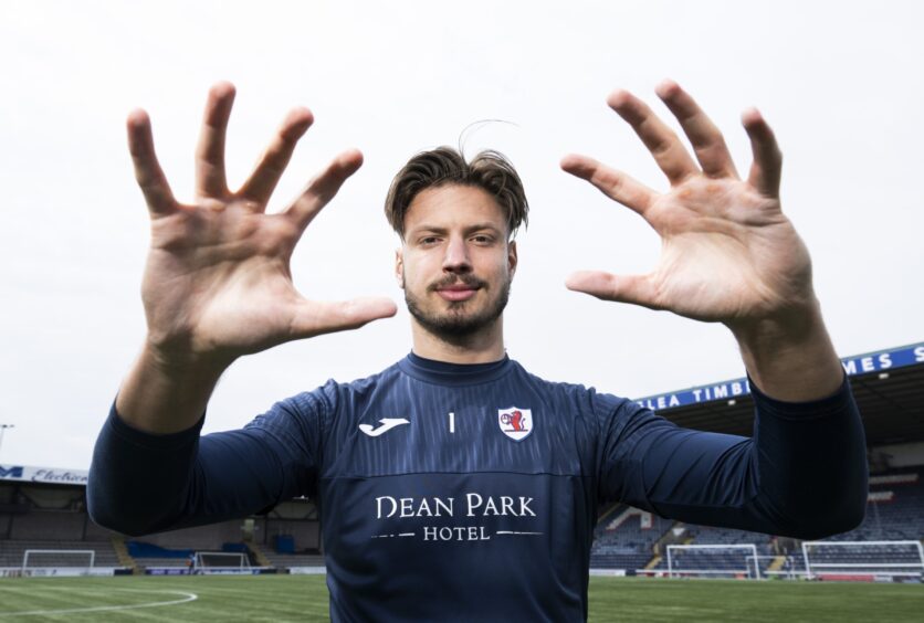 Raith Rovers goalkeeper Kevin Dabrowski holds his hands up for the camera.