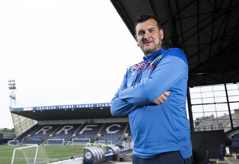 Raith Rovers Manager Ian Murray stands with his arms folded in the Stark's Park main stand ahead of the Premiership play-off final.