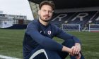 Raith Rovers goalkeeper Kevin Dabrowski sits on the Stark's Park pitch.