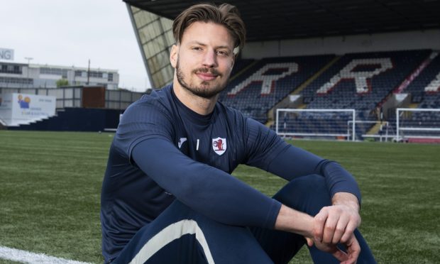 Raith Rovers goalkeeper Kevin Dabrowski sits on the Stark's Park pitch.