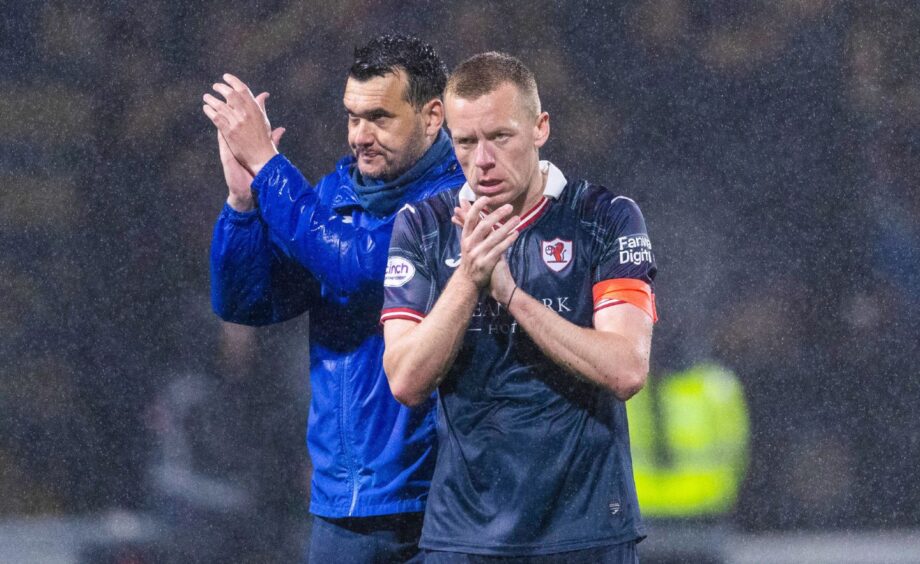 Raith Rovers manager Ian Murray and skipper Scott Brown show their appreciation of the home support at full-time.