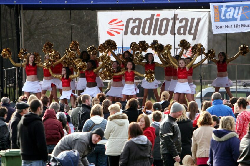 A cheerleading group in stage at the Radio Tay Roadshow 