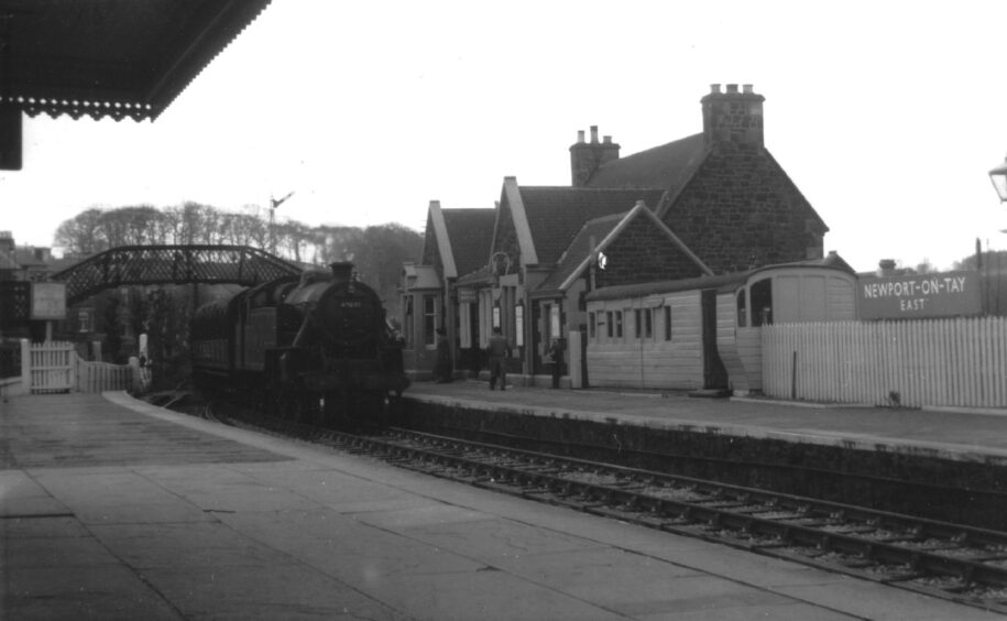 A steam train arriving at East Newport Station. 