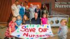 Pete Wishart with campaigners holding banner which reads 'save our nursery'