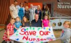 Pete Wishart with campaigners holding banner which reads 'save our nursery'
