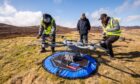 To go with story by Graham Brown. A team of mobile connectivity and drone specialists have demonstrated the use of flying 5G drones as a moving connectivity bubble which could transform mountain search and rescue missions. Picture shows; Angus Glens 5g drone trial. Tarfside. Supplied by Alan Richardson Date; 23/03/2024