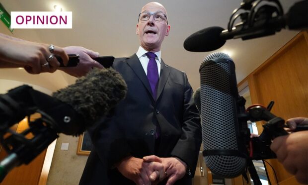 First Minister John Swinney.