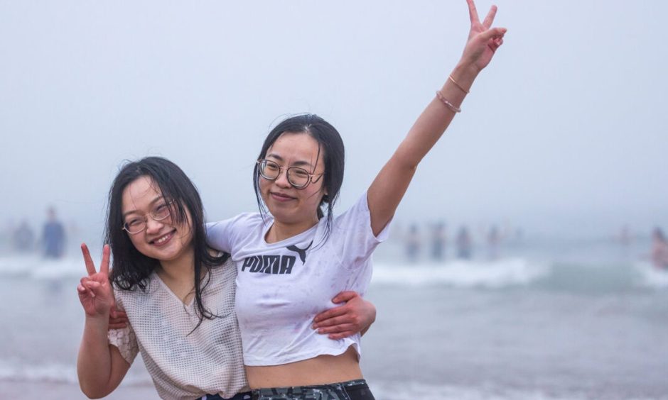 St Andrews University students take part in the annual May Day dip.