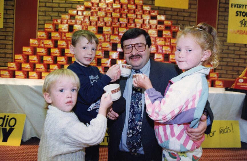 Ally Bally and three youngsters at the launch of the 1992 Radio Tay Caring for Kids campaign. 