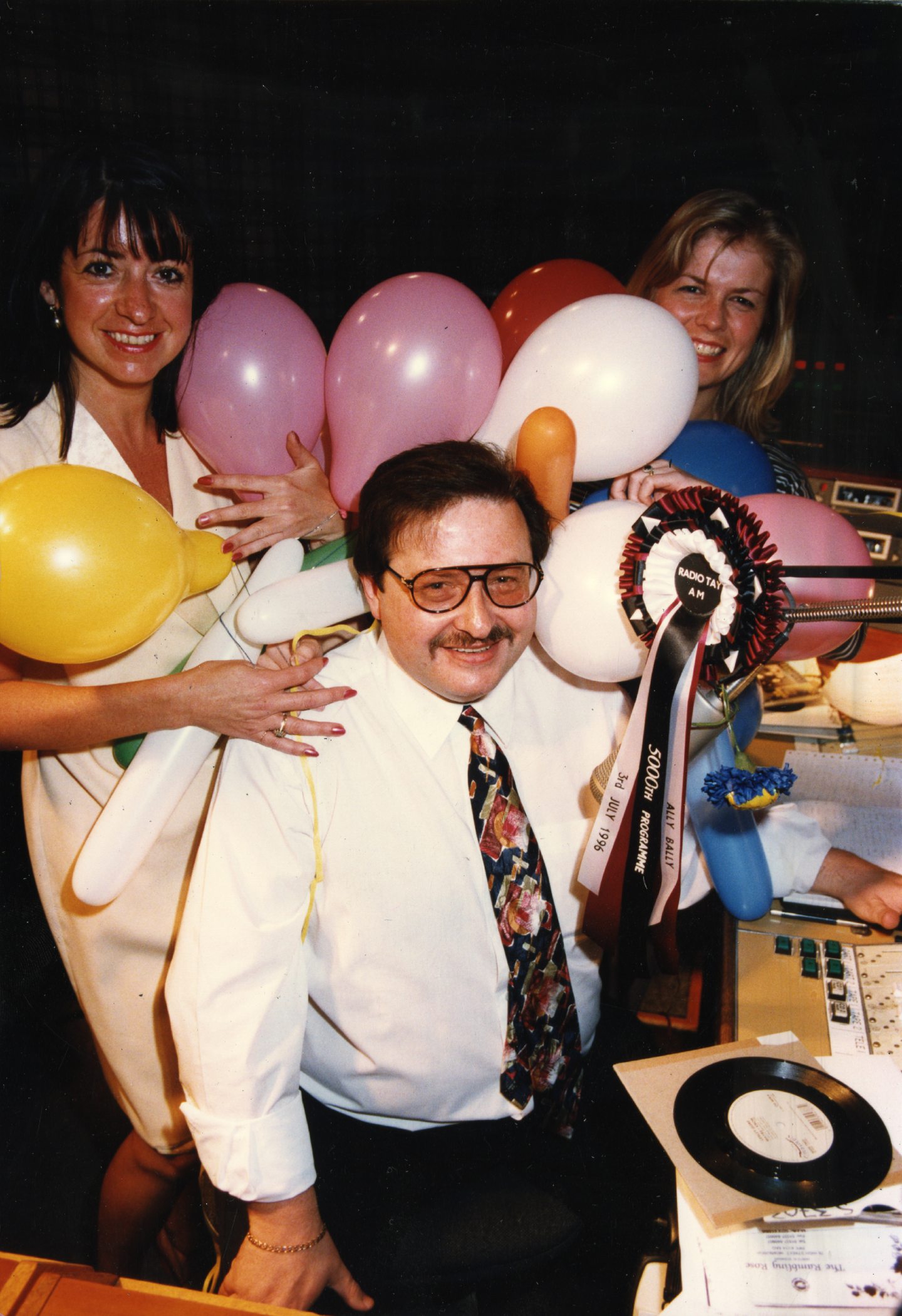 Ally Bally and two Radio Tay colleagues with ballonns 