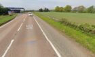 Police closed the A85 in both directions. Image: Google Street View.