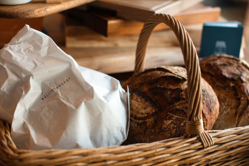 Bread in basket with Ballintaggart branded paper bag