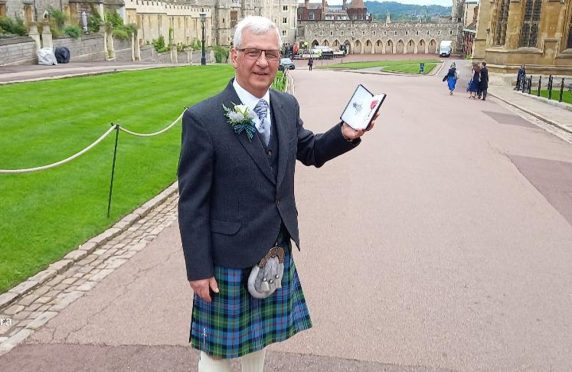 Proud Bob Christie MBE after the Windsor Investiture. Image: Supplied