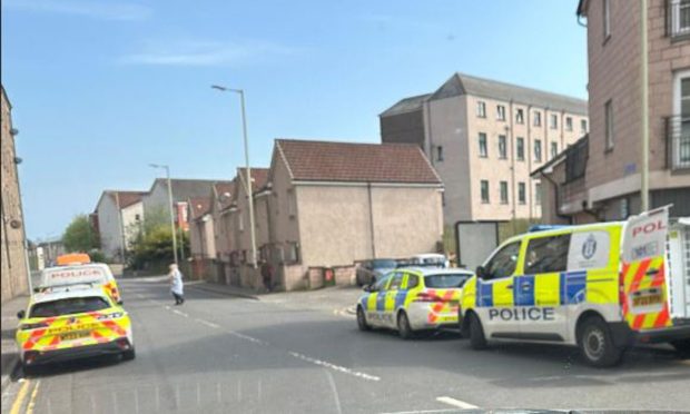 Police on Brook Street following the incident. Image: Supplied.