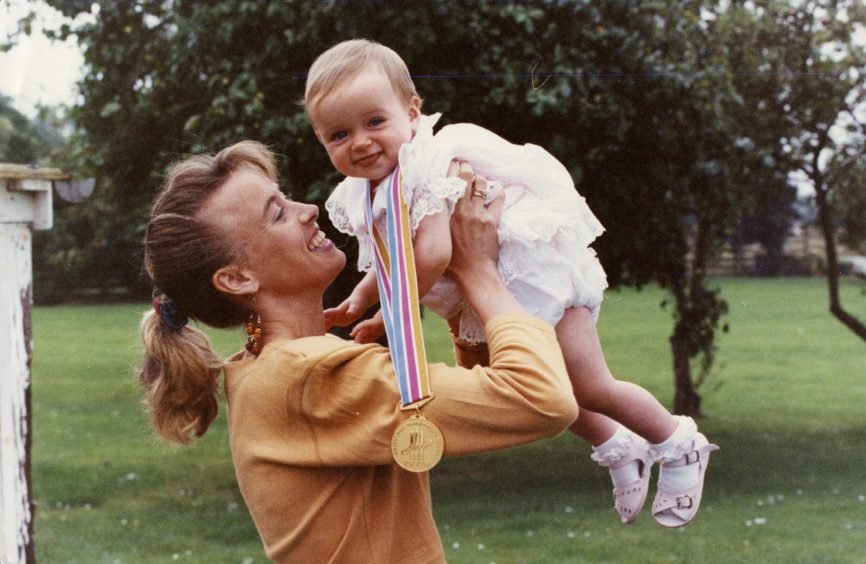 Liz holding daughter Eilish McColgan in September 1991. 