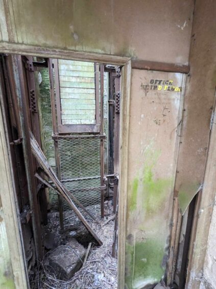Discovering the 'secret' elevator inside Crawford Priory. Image: Gayle Ritchie.