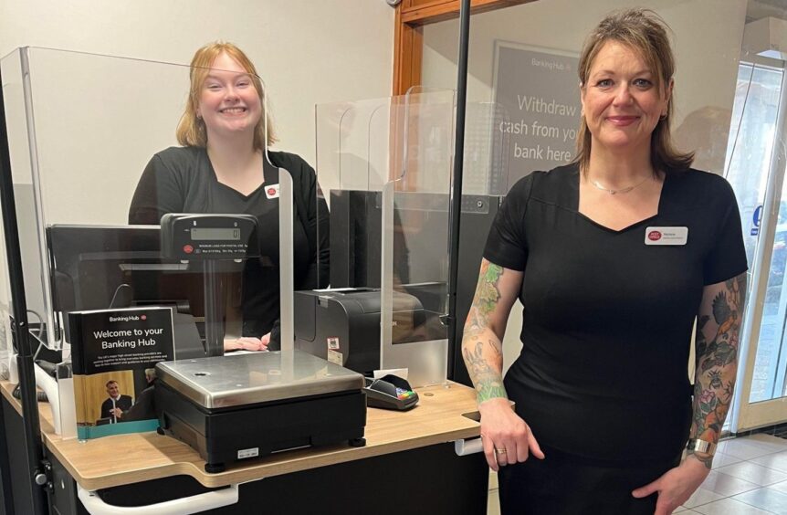 Marlene Wood and Fiona Graham standing at Crieff banking hub counter